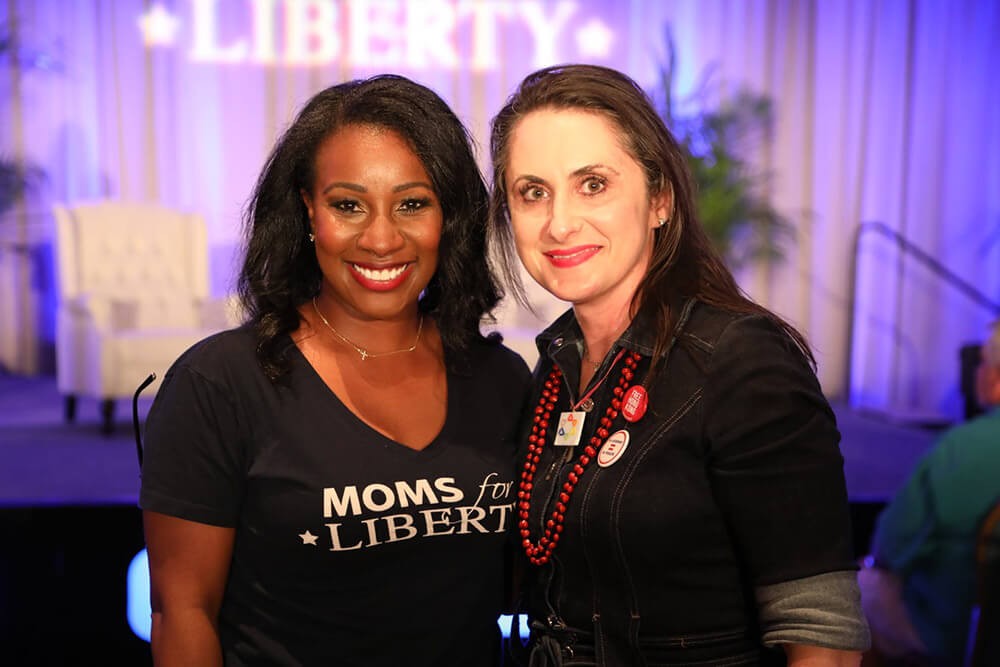 two-women-smiling-at-m4l-event